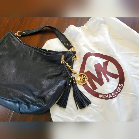 Classic black Michael Kors handbag with tassels and MK charm - Picture 5 of 5